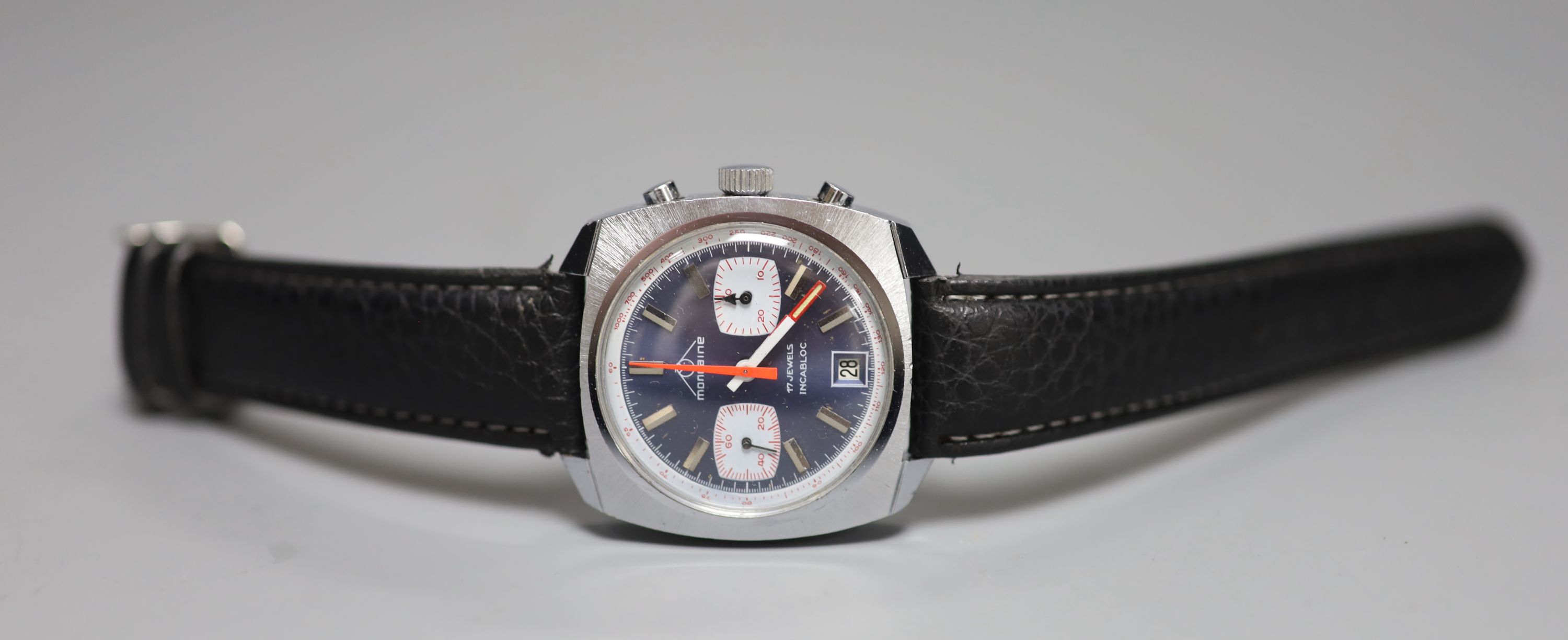A gentlemans 1970s stainless steel Mondaine chronograph blue dial manual wind wrist watch, in later leather strap.